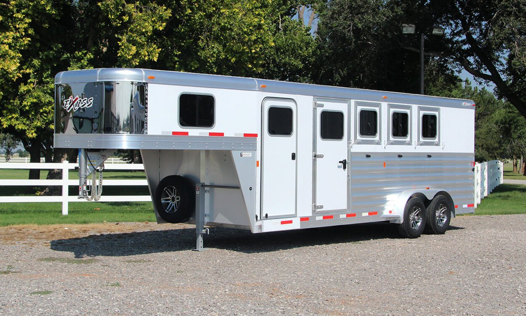 New 2025 Exiss Trailers 7400 4 HORSE GN Stock / Stock Combo Trailer
