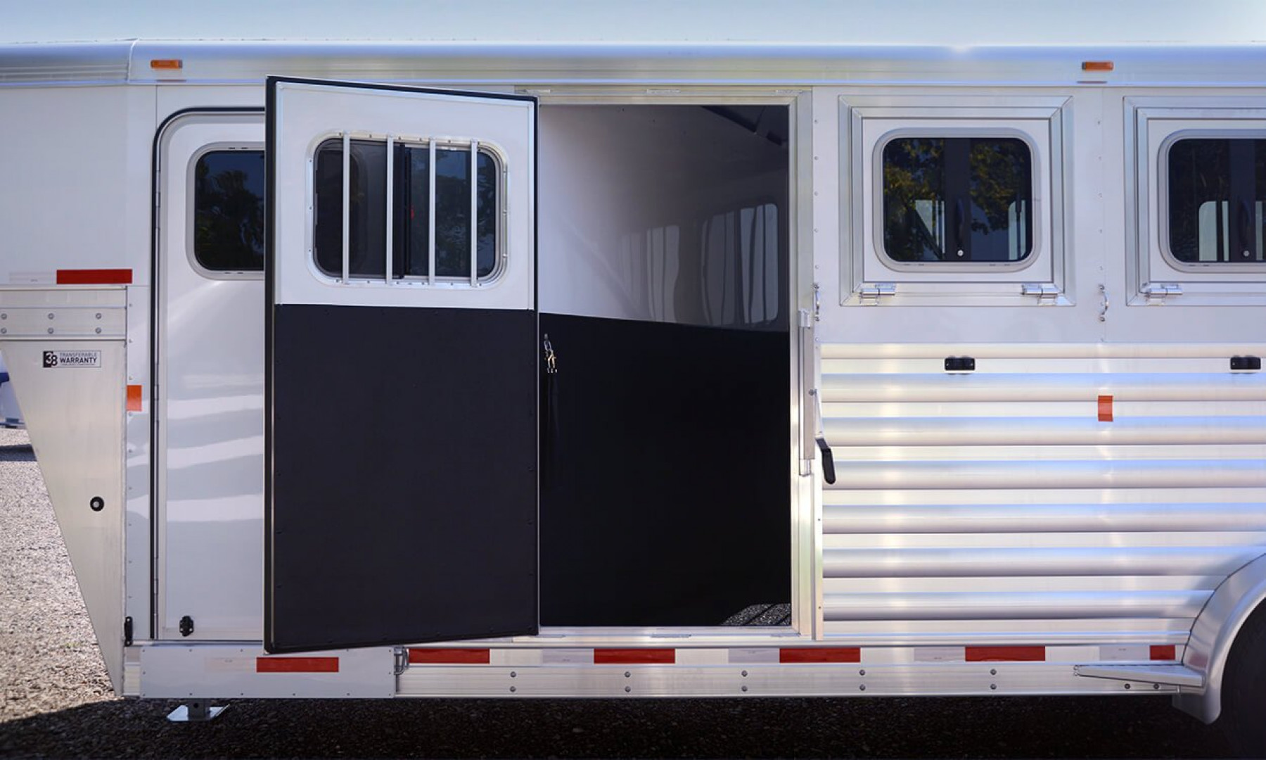 New 2025 Exiss Trailers 7400 4 HORSE GN Stock / Stock Combo Trailer