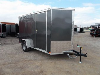 New 2025 Covered Wagon Trailers 6x12 SA Cargo Trailer / Enclosed Trailer / 6'6" Interior / 36" RV Side Door / Bed Lined Tongue and Frame / .030 Charcoal Gray Semi-Screwless Exterior / (4) D-Rings / Extra Wide Ramp
