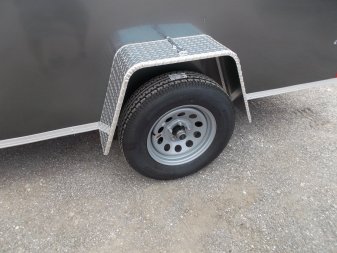 New 2025 Covered Wagon Trailers 6x12 SA Cargo Trailer / Enclosed Trailer / 6'6" Interior / 36" RV Side Door / Bed Lined Tongue and Frame / .030 Charcoal Gray Semi-Screwless Exterior / (4) D-Rings / Extra Wide Ramp