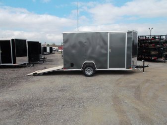 New 2025 Covered Wagon Trailers 6x12 SA Cargo Trailer / Enclosed Trailer / 6'6" Interior / 36" RV Side Door / Bed Lined Tongue and Frame / .030 Charcoal Gray Semi-Screwless Exterior / (4) D-Rings / Extra Wide Ramp