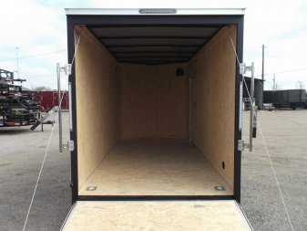 New 2025 Covered Wagon Trailers 6x12 SA Cargo Trailer / Enclosed Trailer / 6'6" Interior / 36" RV Side Door / Bed Lined Tongue and Frame / .030 Charcoal Gray Semi-Screwless Exterior / (4) D-Rings / Extra Wide Ramp