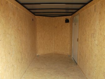 New 2025 Covered Wagon Trailers 6x12 SA Cargo Trailer / Enclosed Trailer / 6'6" Interior / 36" RV Side Door / Bed Lined Tongue and Frame / .030 Charcoal Gray Semi-Screwless Exterior / (4) D-Rings / Extra Wide Ramp