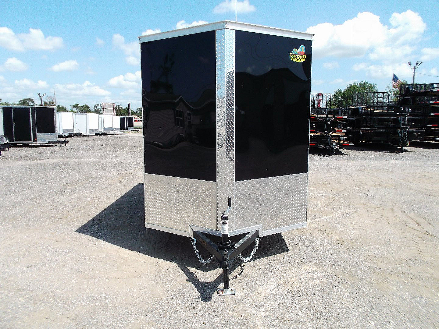 New 2025 Covered Wagon Trailers 6x12 SA Cargo / Enclosed Trailer / Extra Wide Ramp / 36" RV Side Door / 6'6" Interior / Bed Lined Tongue and Frame / (4) D-Rings / .030 Black Semi-Screwless Exterior