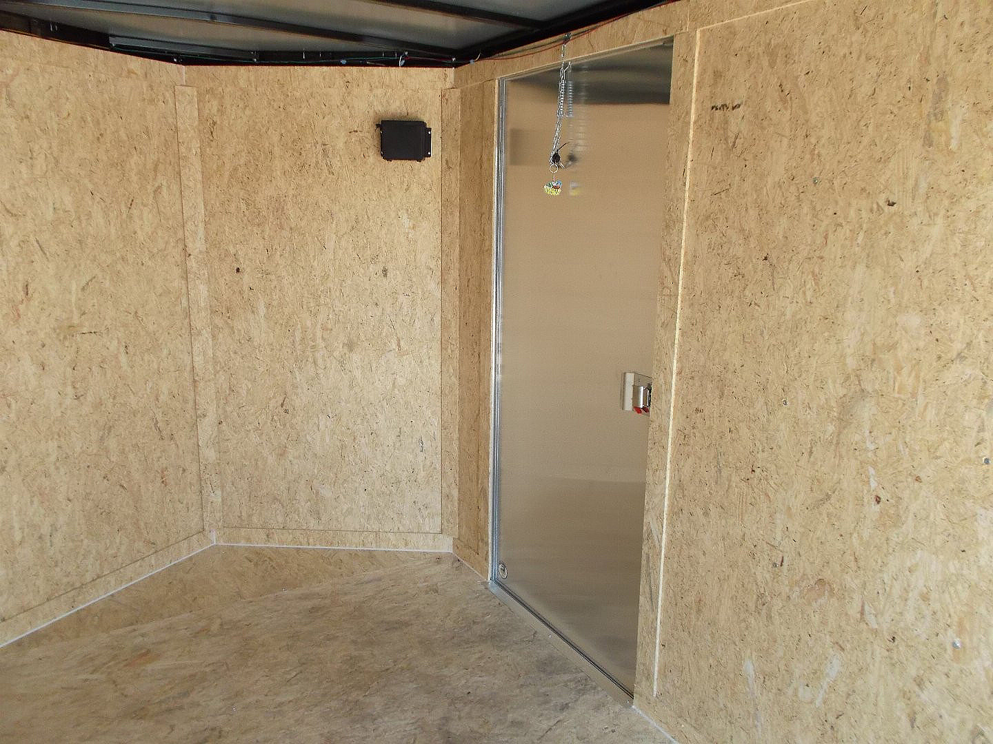 New 2025 Covered Wagon Trailers 6x12 SA Cargo / Enclosed Trailer / Extra Wide Ramp / 36" RV Side Door / 6'6" Interior / Bed Lined Tongue and Frame / (4) D-Rings / .030 Black Semi-Screwless Exterior