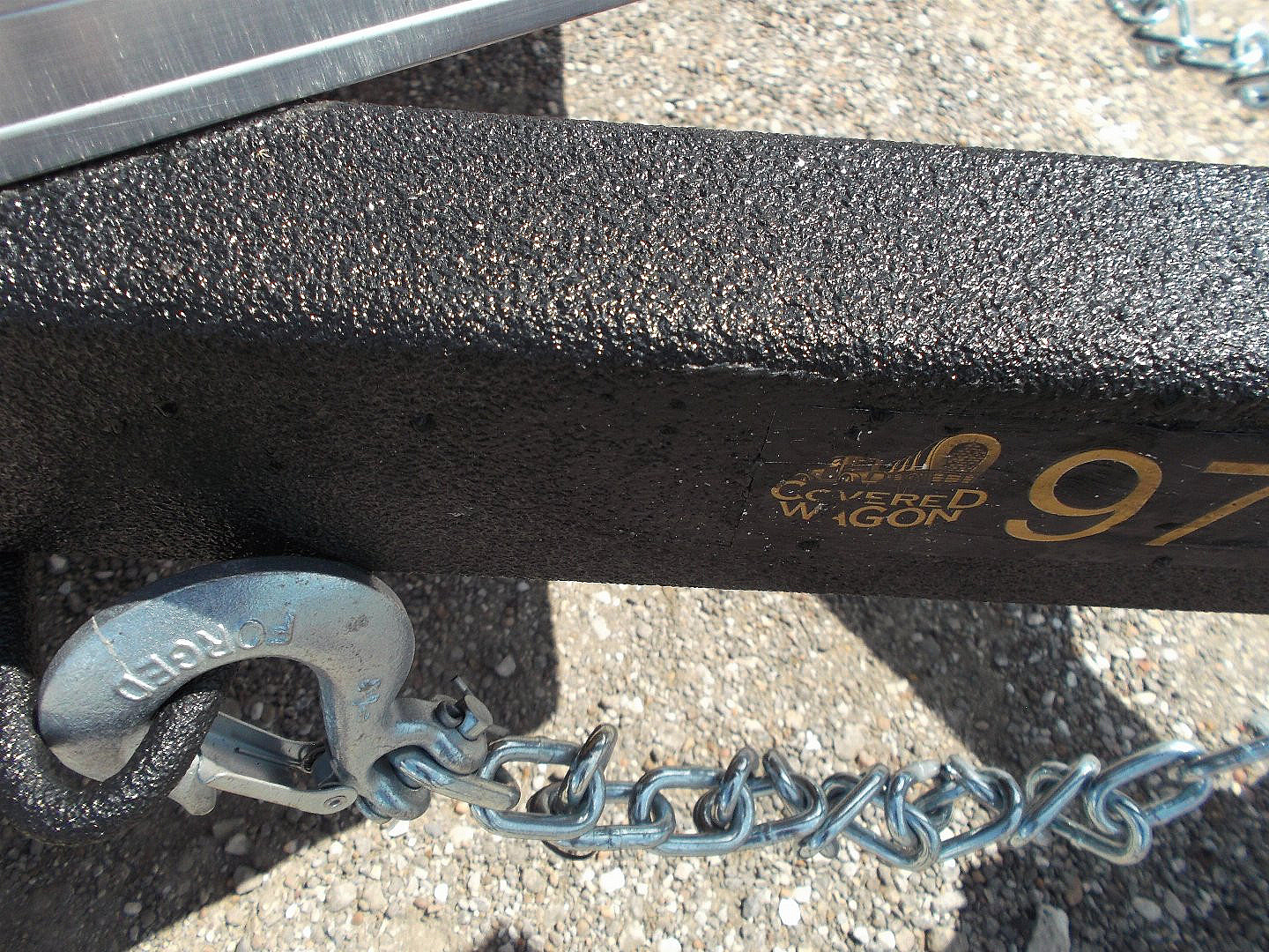 New 2025 Covered Wagon Trailers 6x12 SA Cargo / Enclosed Trailer / Extra Wide Ramp / 36" RV Side Door / 6'6" Interior / Bed Lined Tongue and Frame / (4) D-Rings / .030 Black Semi-Screwless Exterior