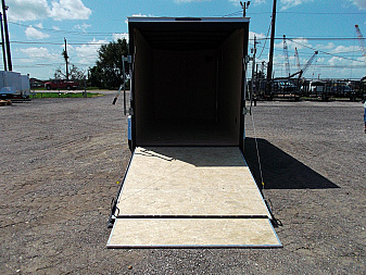 New 2025 Covered Wagon Trailers 6x12 SA Cargo / Enclosed Trailer / Extra Wide Ramp / 36" RV Side Door / 6'6" Interior / Bed Lined Tongue and Frame / (4) D-Rings / .030 Black Semi-Screwless Exterior
