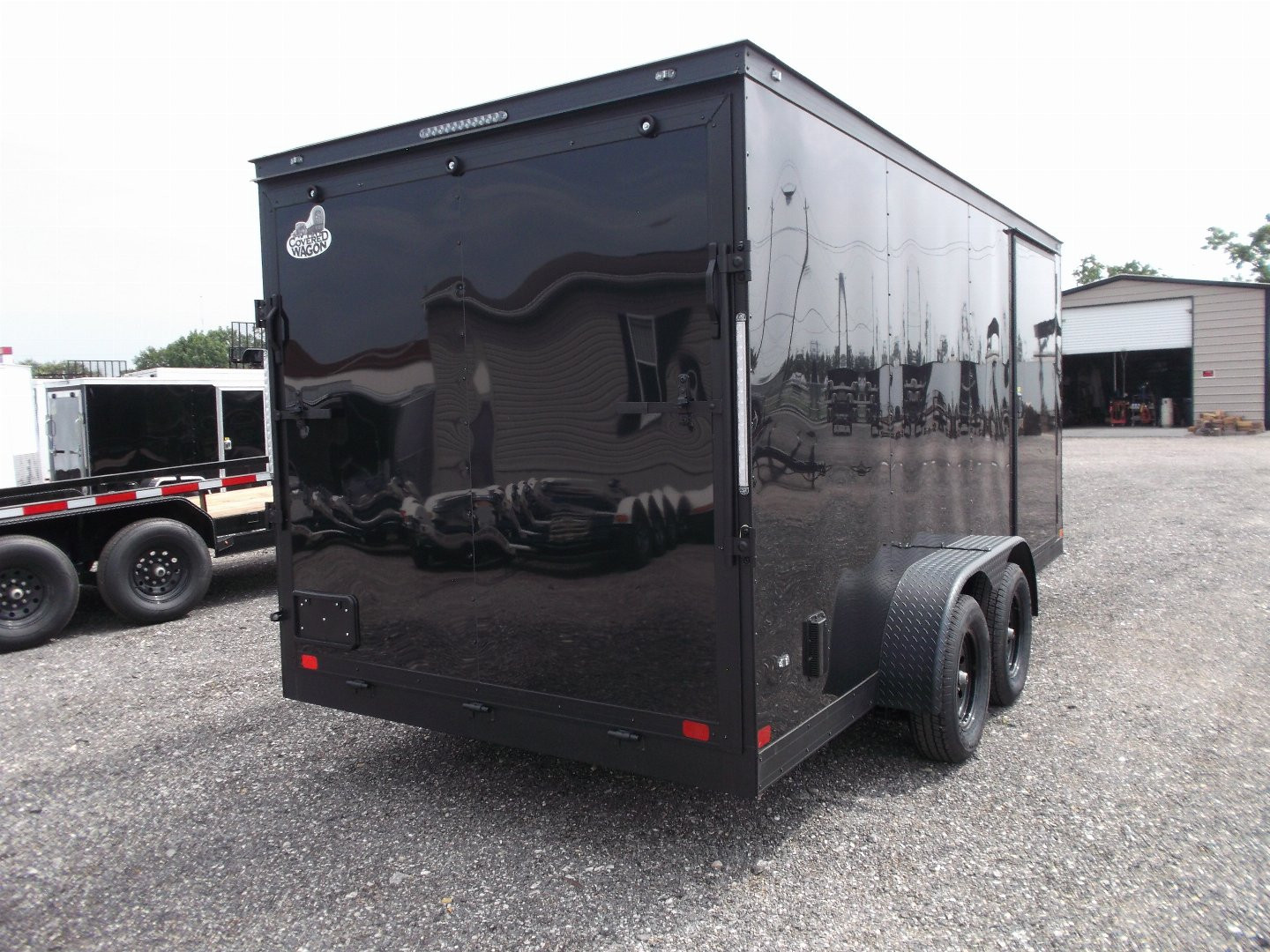 New 2025 COVERED WAGON TRAILERS 7x16 Cargo Trailer / Enclosed Trailer / 7ft Interior / Extra Wide Ramp / 48" RV Side Door / LEDs / .030 Black Semi-Screwless Exterior / Black Out Package