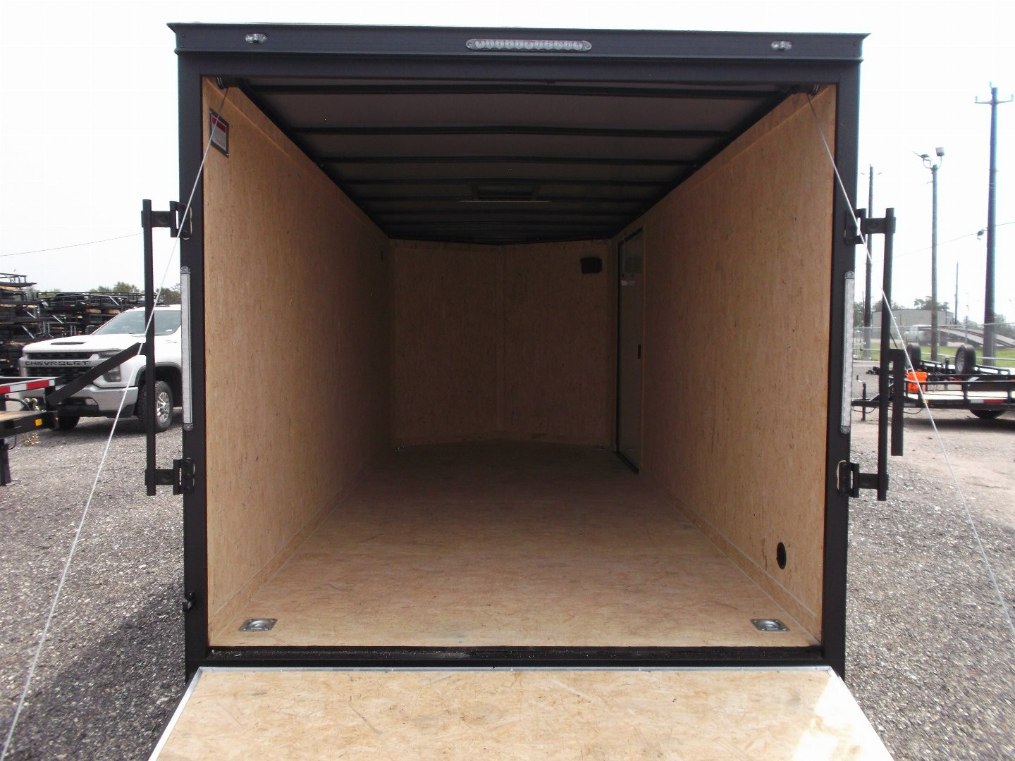 New 2025 COVERED WAGON TRAILERS 7x16 Cargo Trailer / Enclosed Trailer / 7ft Interior / Extra Wide Ramp / 48" RV Side Door / LEDs / .030 Black Semi-Screwless Exterior / Black Out Package