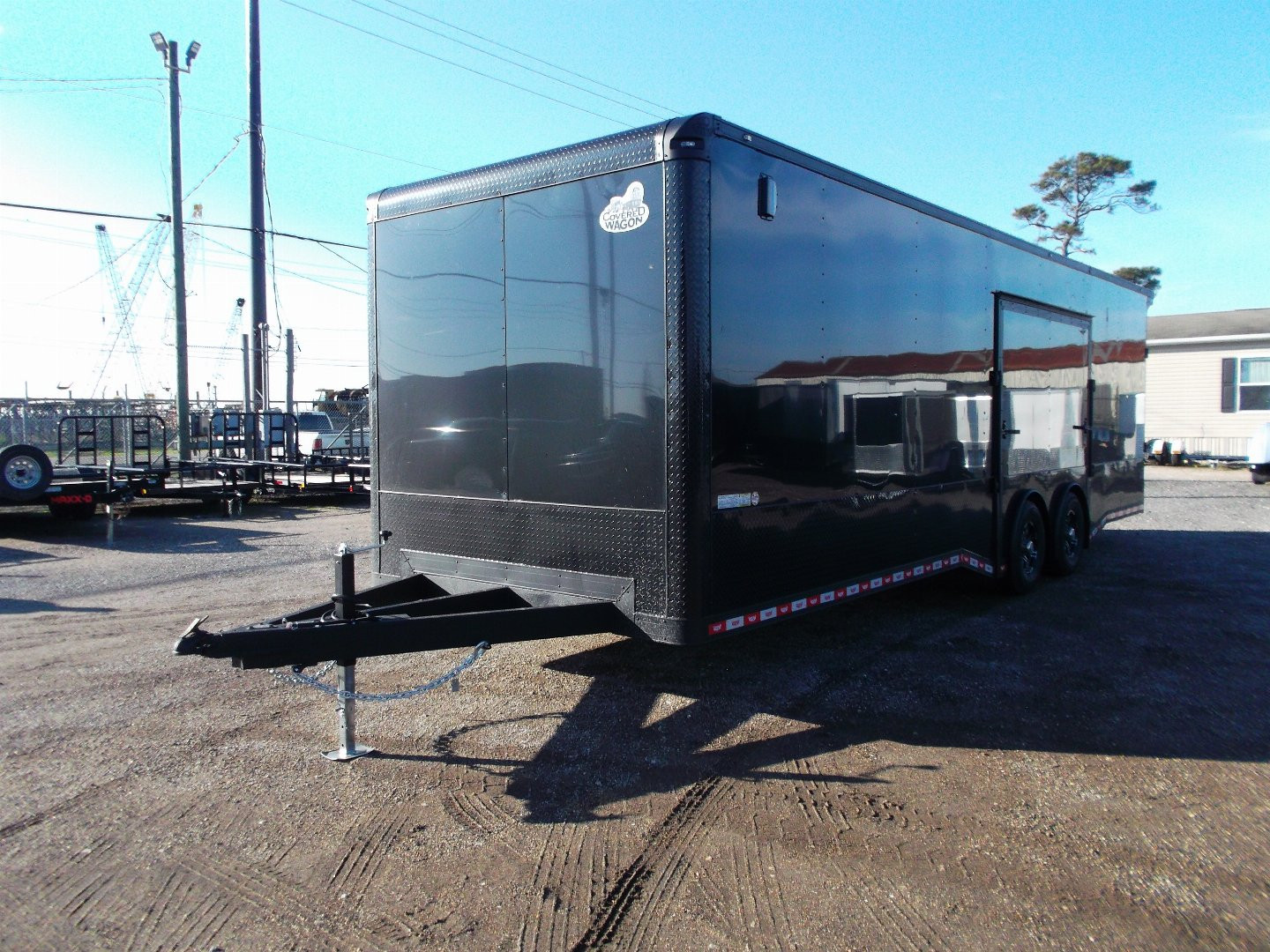 New 2025 COVERED WAGON 8.5x28 Race Trailer / Cargo Trailer / XXL Package / 7'6" Interior Height / Split 7000# Torsion Axles / Heavy Duty Extra Wide Ramp / .080 Black Poly Core / Rear Spoiler w/ LEDS / Side Wall Escape Door / Mag Wheels / Black Out Package