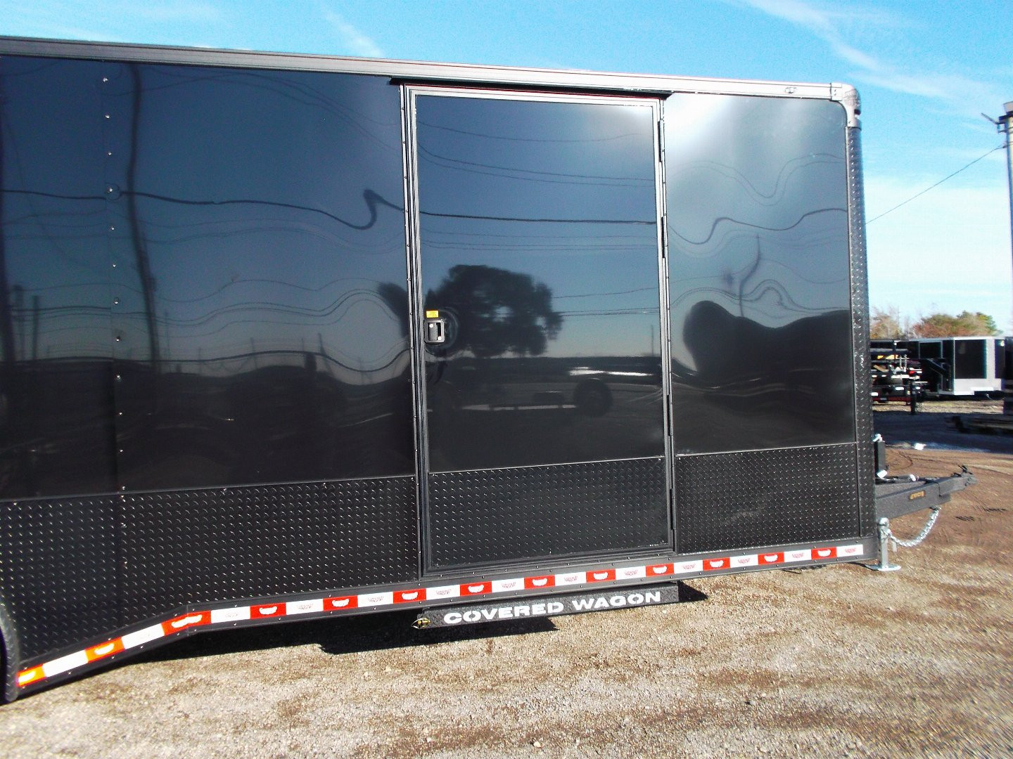 New 2025 COVERED WAGON 8.5x28 Race Trailer / Cargo Trailer / XXL Package / 7'6" Interior Height / Split 7000# Torsion Axles / Heavy Duty Extra Wide Ramp / .080 Black Poly Core / Rear Spoiler w/ LEDS / Side Wall Escape Door / Mag Wheels / Black Out Package