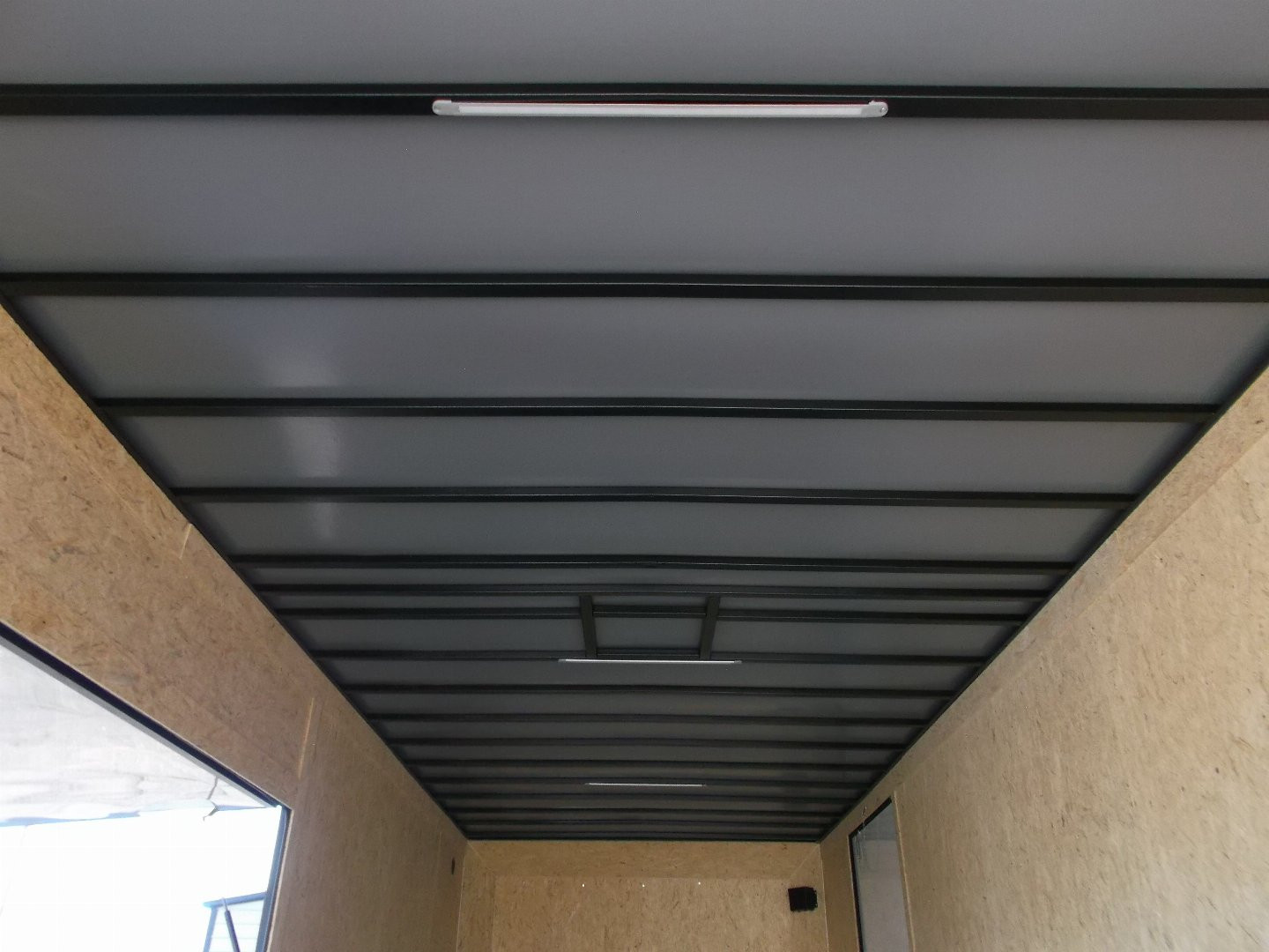 New 2025 COVERED WAGON 8.5x28 Race Trailer / Cargo Trailer / XXL Package / 7'6" Interior Height / Split 7000# Torsion Axles / Heavy Duty Extra Wide Ramp / .080 Black Poly Core / Rear Spoiler w/ LEDS / Side Wall Escape Door / Mag Wheels / Black Out Package