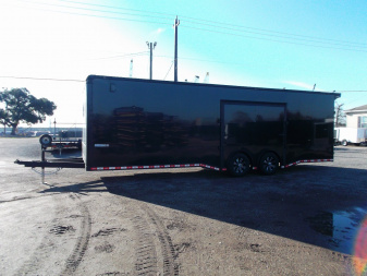 New 2025 COVERED WAGON 8.5x28 Race Trailer / Cargo Trailer / XXL Package / 7'6" Interior Height / Split 7000# Torsion Axles / Heavy Duty Extra Wide Ramp / .080 Black Poly Core / Rear Spoiler w/ LEDS / Side Wall Escape Door / Mag Wheels / Black Out Package