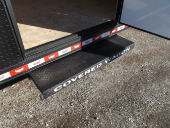 New 2025 COVERED WAGON 8.5x28 Race Trailer / Cargo Trailer / XXL Package / 7'6" Interior Height / Split 7000# Torsion Axles / Heavy Duty Extra Wide Ramp / .080 Black Poly Core / Rear Spoiler w/ LEDS / Side Wall Escape Door / Mag Wheels / Black Out Package