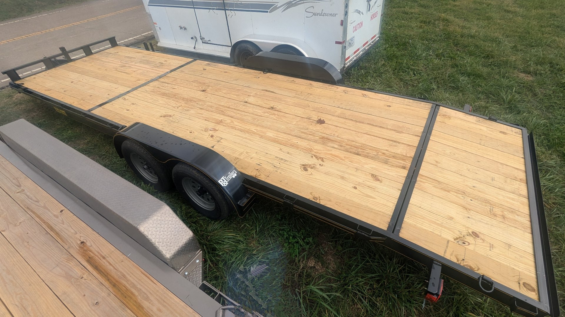 New 2025 P & T Trailers 82X24 CARHAULER 7K Utility Trailer