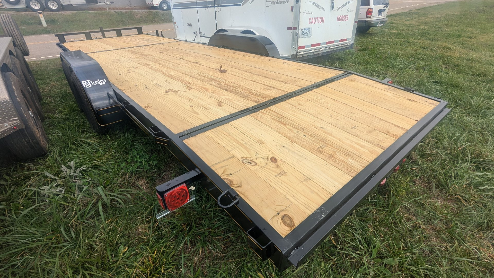 New 2025 P & T Trailers 82X24 CARHAULER 7K Utility Trailer