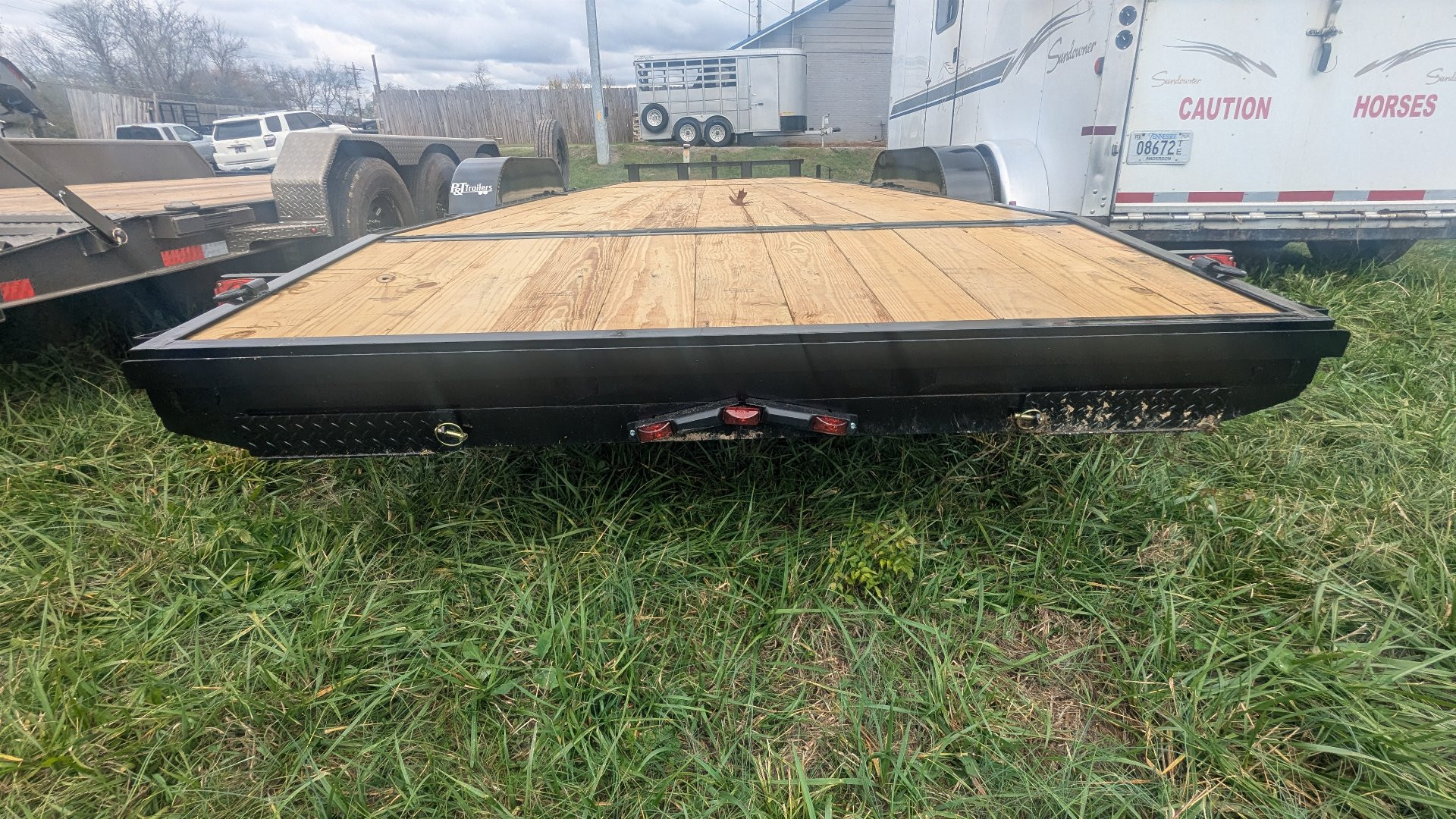 New 2025 P & T Trailers 82X24 CARHAULER 7K Utility Trailer
