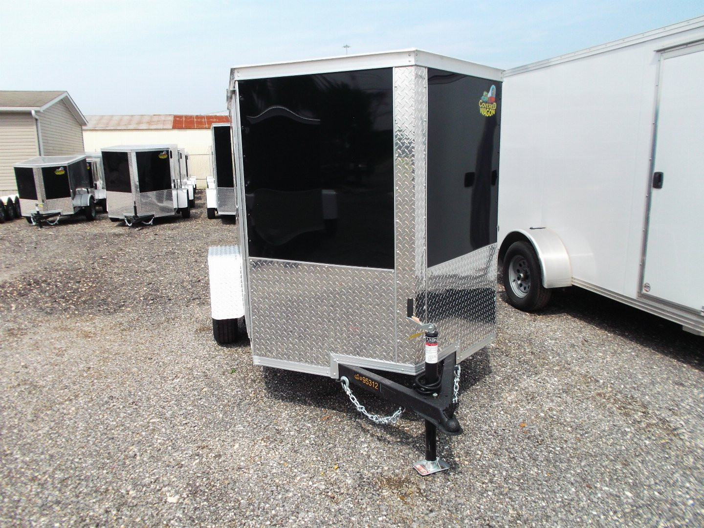 New 2025 COVERED WAGON TRAILERS 5x8 Single Axle Cargo Trailer / Enclosed Trailer / Ramp / Side Door / .030 Black Semi-Screwless Exterior