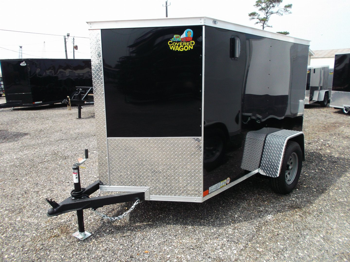 New 2025 COVERED WAGON TRAILERS 5x8 Single Axle Cargo Trailer / Enclosed Trailer / Ramp / Side Door / .030 Black Semi-Screwless Exterior