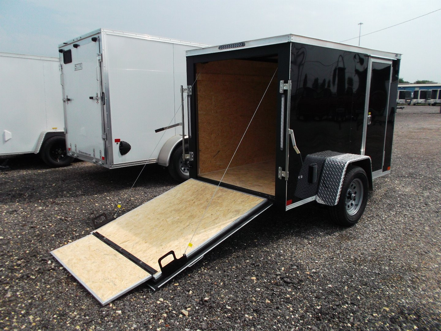 New 2025 COVERED WAGON TRAILERS 5x8 Single Axle Cargo Trailer / Enclosed Trailer / Ramp / Side Door / .030 Black Semi-Screwless Exterior