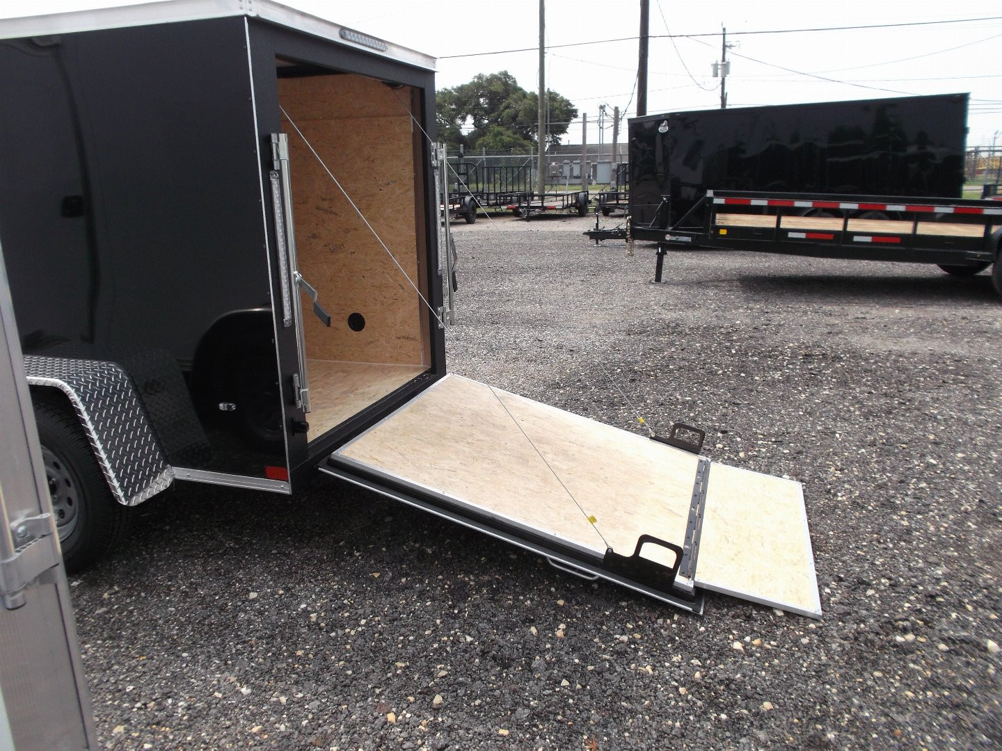 New 2025 COVERED WAGON TRAILERS 5x8 Single Axle Cargo Trailer / Enclosed Trailer / Ramp / Side Door / .030 Black Semi-Screwless Exterior