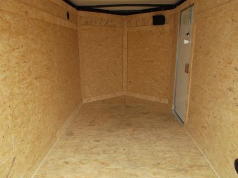 New 2025 COVERED WAGON TRAILERS 5x8 Single Axle Cargo Trailer / Enclosed Trailer / Ramp / Side Door / .030 Black Semi-Screwless Exterior