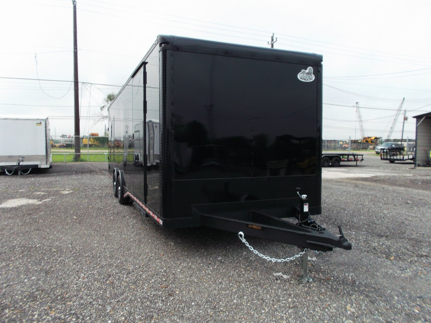 New 2025 COVERED WAGON TRAILERS 8.5x28 Race Trailer / Cargo Trailer / XXL Package / 7'6" Interior Height / Split 7000# Torsion Axles / Heavy Duty Extra Wide Ramp / .080 Black Poly Core / Black Out Package