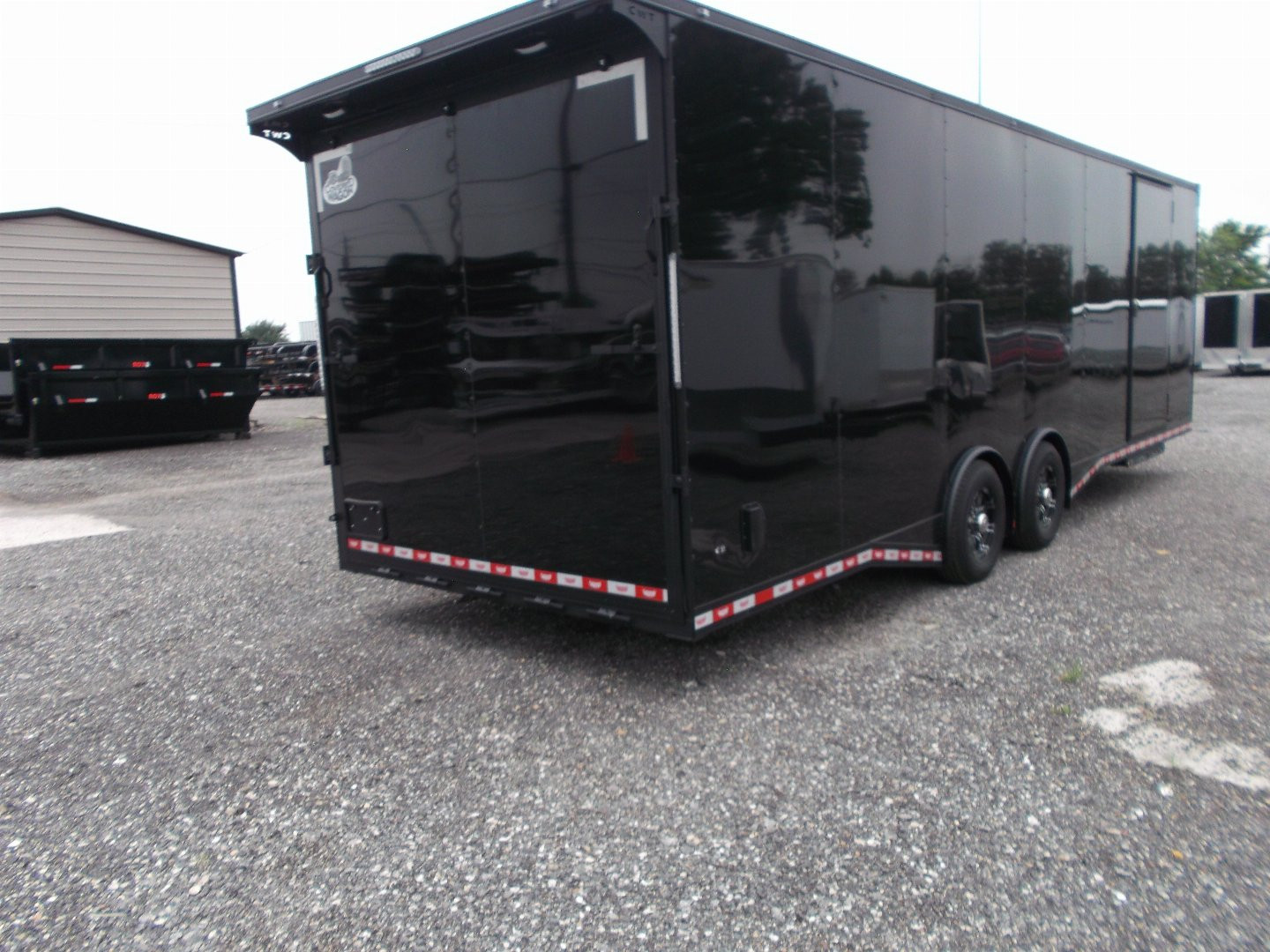 New 2025 COVERED WAGON TRAILERS 8.5x28 Race Trailer / Cargo Trailer / XXL Package / 7'6" Interior Height / Split 7000# Torsion Axles / Heavy Duty Extra Wide Ramp / .080 Black Poly Core / Black Out Package
