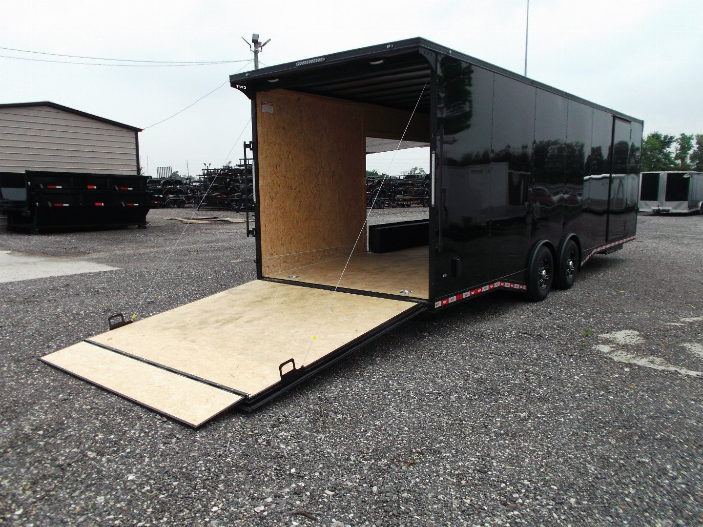 New 2025 COVERED WAGON TRAILERS 8.5x28 Race Trailer / Cargo Trailer / XXL Package / 7'6" Interior Height / Split 7000# Torsion Axles / Heavy Duty Extra Wide Ramp / .080 Black Poly Core / Black Out Package