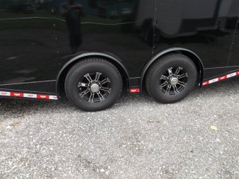 New 2025 COVERED WAGON TRAILERS 8.5x28 Race Trailer / Cargo Trailer / XXL Package / 7'6" Interior Height / Split 7000# Torsion Axles / Heavy Duty Extra Wide Ramp / .080 Black Poly Core / Black Out Package