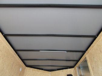 New 2024 Covered Wagon Trailers 6x10 Single Axle Cargo Trailer / Enclosed Trailer / Extra Wide Ramp / 6'6" Interior / RV Side Door / LEDs / .030 White Semi-Screwless Exterior