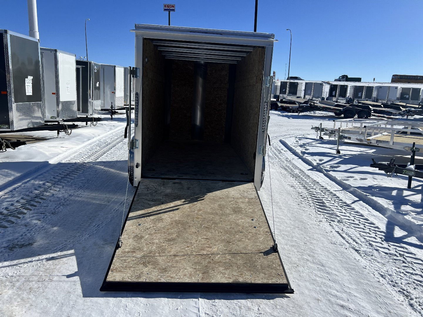 New 2025 R&M (Bighorn) 5x10  +2’V Nose Rear Ramp Enclosed Cargo