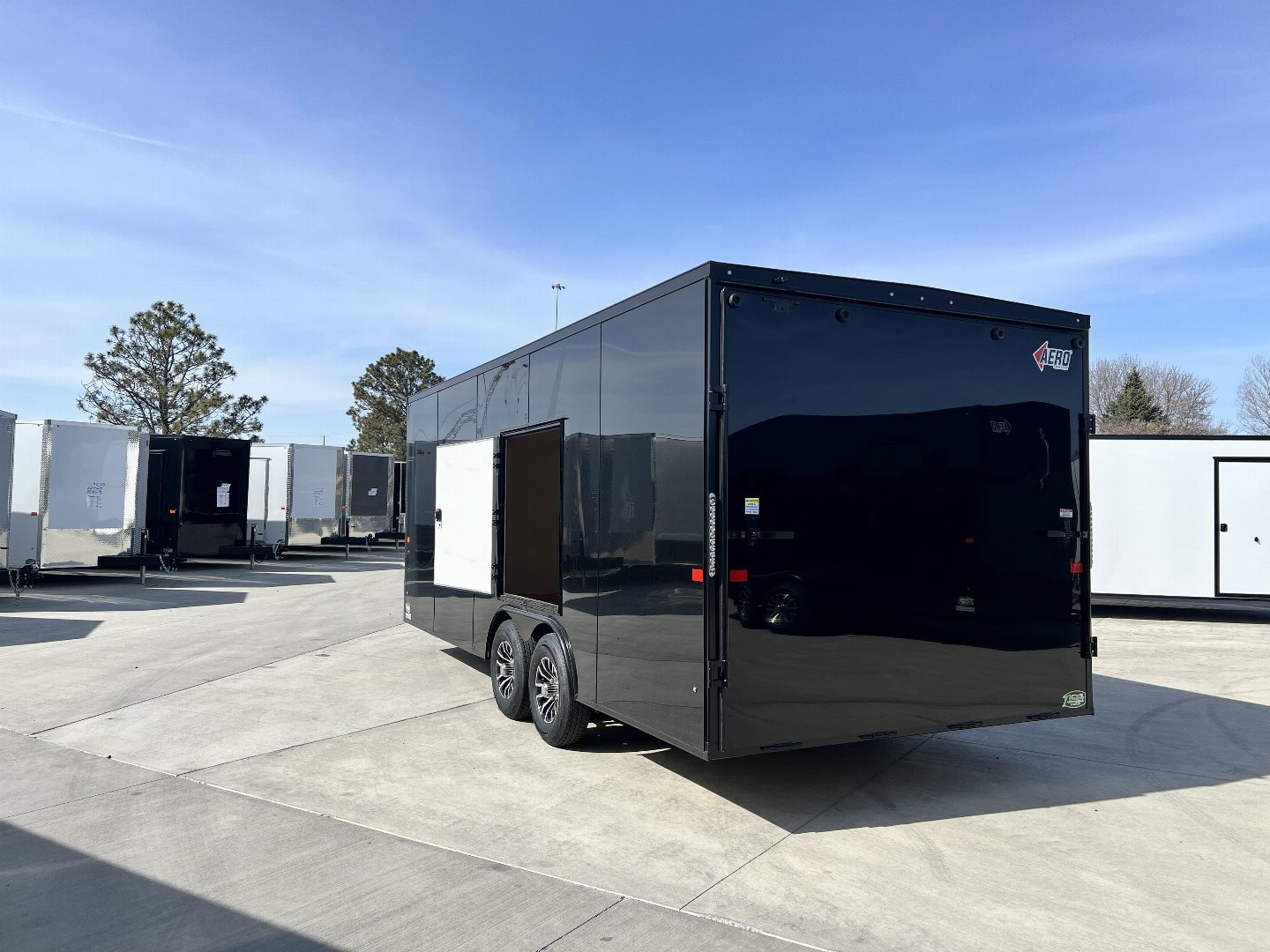 New 2025 AERO 8.5x20 +2’V 7' TALL WHITE Interior 4'X4' ESCAPE DOOR, BLACKOUT  EDITION QUALITY .080 Poly Core Enclosed Rear Ramp Car Hauler Cargo Trailer
