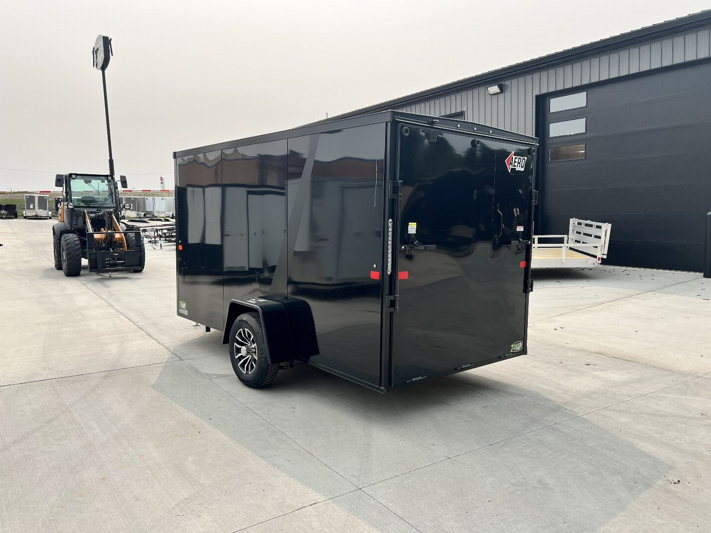New NEW 2025 AERO 6x12 +2V BLACKOUT Edition, White Interior, QUALITY Enclosed Rear Ramp Cargo Trailer
