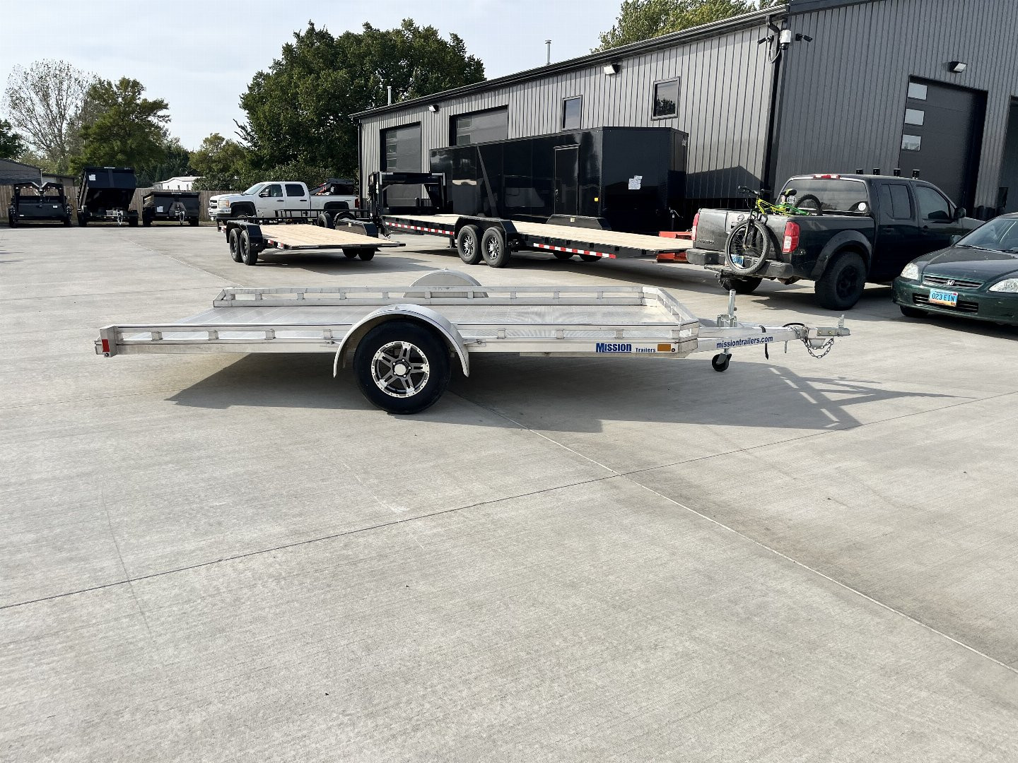 Used 2021 Mission All Aluminum 77"x14' utility TILT flatbed Aluminum Wheels Trailer