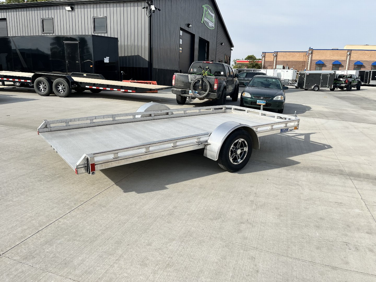 Used 2021 Mission All Aluminum 77"x14' utility TILT flatbed Aluminum Wheels Trailer
