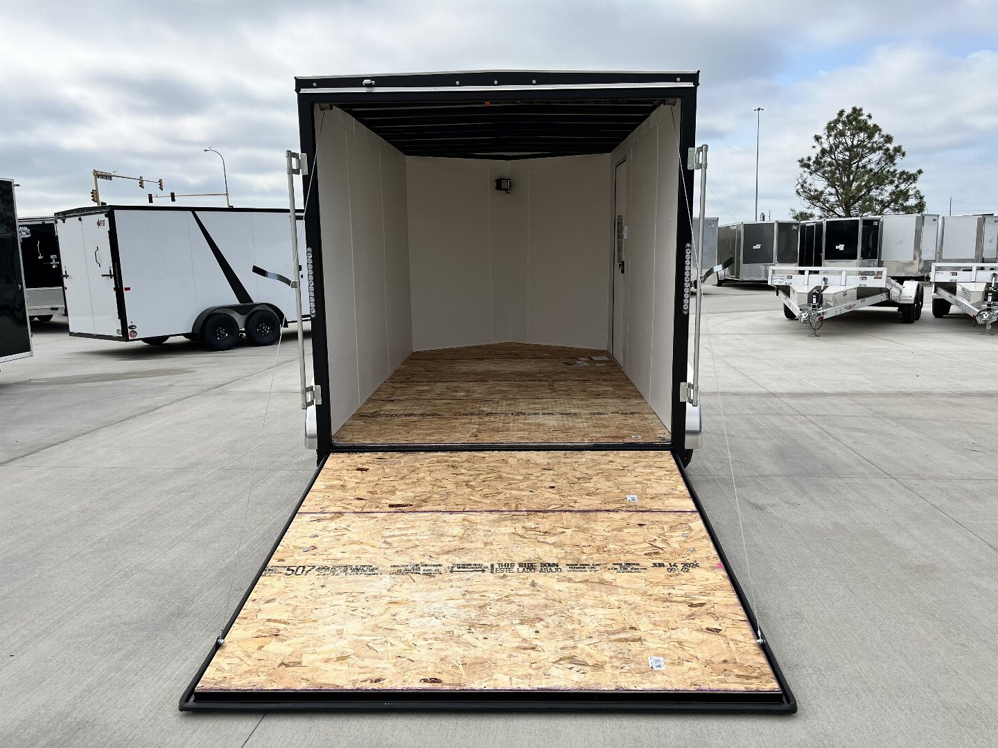 New NEW 2025 AERO 7x12 +2 V QUALITY WHITE Interior Enclosed Rear Ramp Cargo Trailer