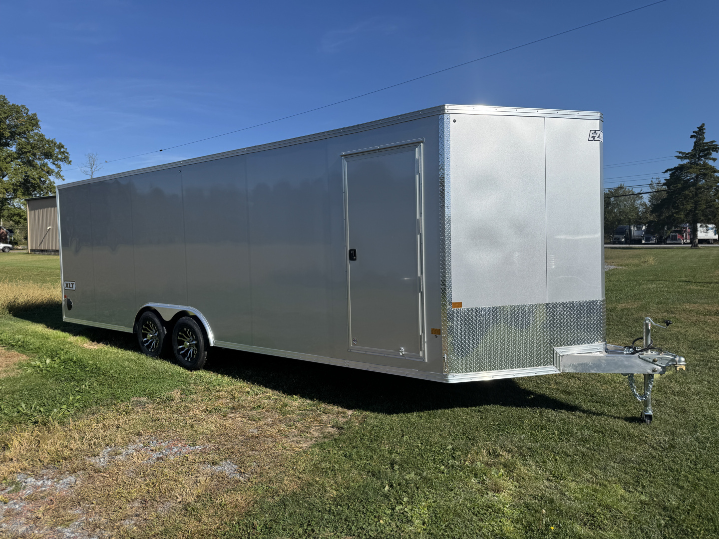 New 2026 E-Z Hauler EZEC8.5X24CH-XLT-P Car Hauler 6 FOOT 10 INCH INTERIOR HEIGHT 4 FOOT ESCAPE DOOR FREE ALUMINUM WHEEL UPGRADE SUMMER SALE ON NOW