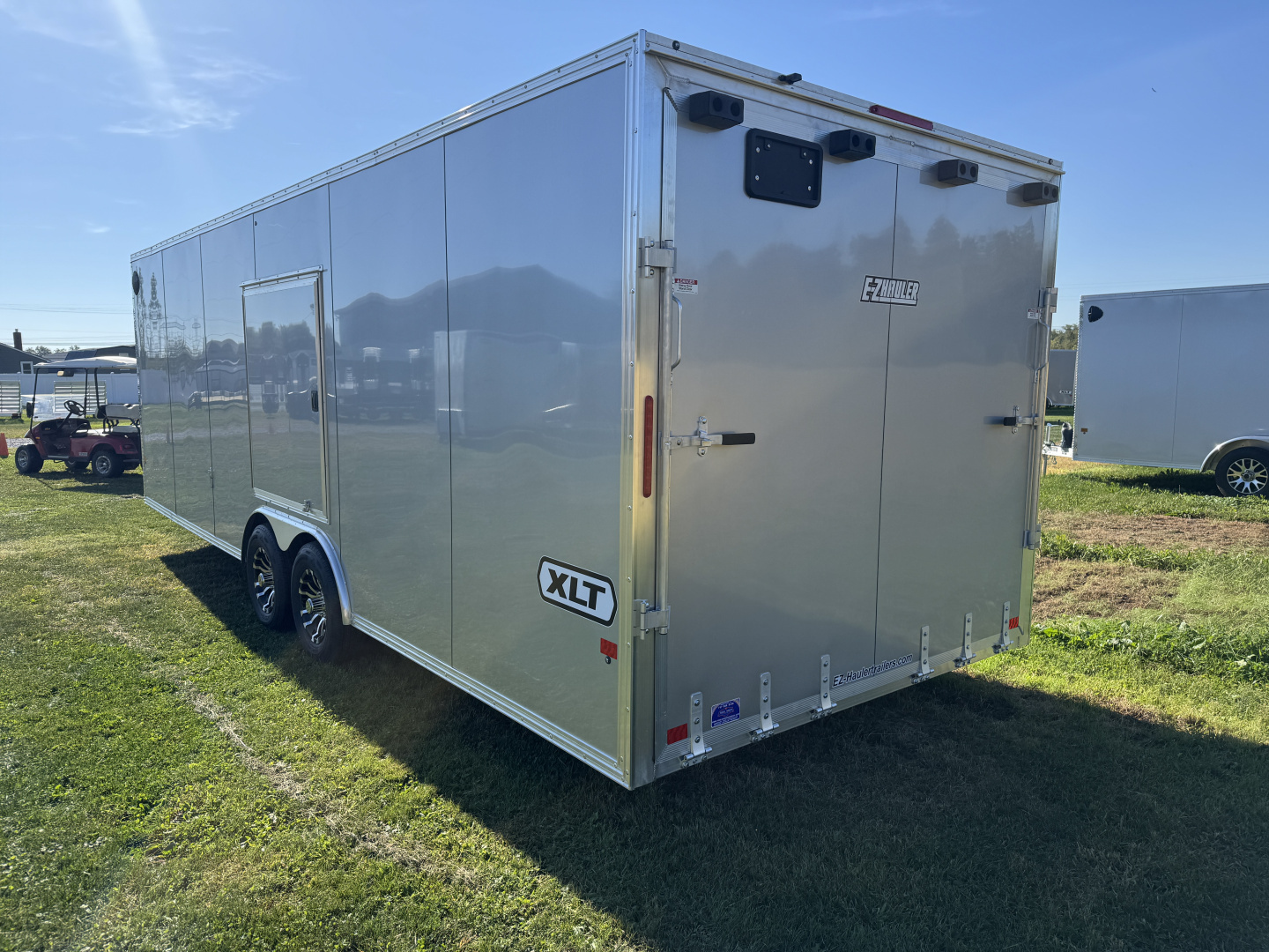 New 2026 E-Z Hauler EZEC8.5X24CH-XLT-P Car Hauler 6 FOOT 10 INCH INTERIOR HEIGHT 4 FOOT ESCAPE DOOR FREE ALUMINUM WHEEL UPGRADE SUMMER SALE ON NOW