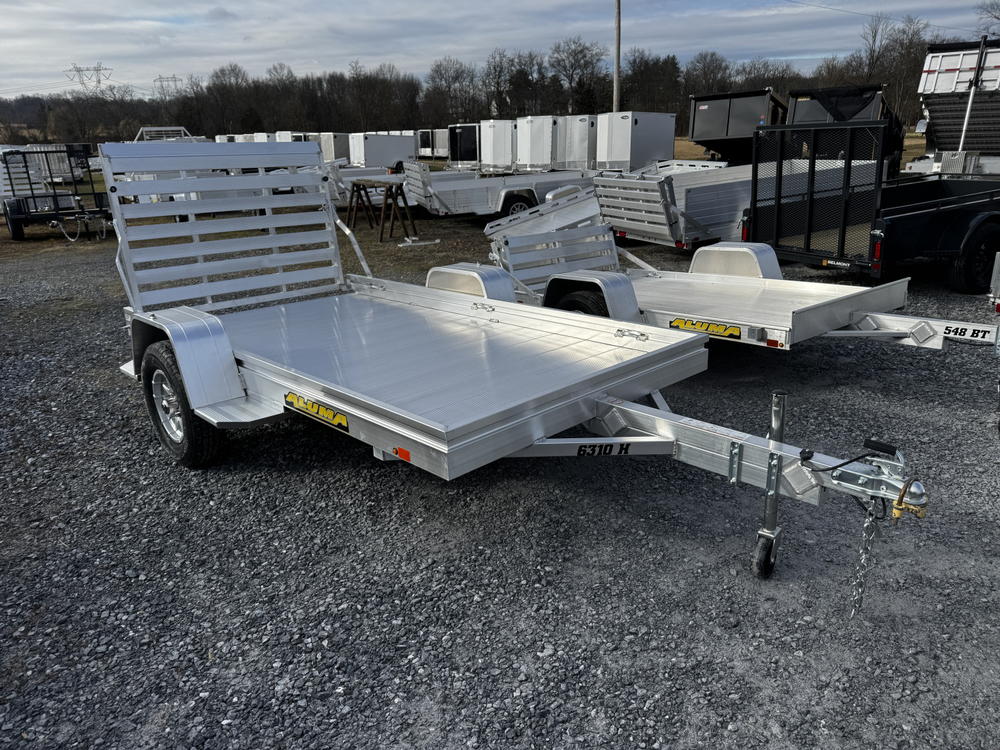 New 2027 Aluma 6310H-S-BT One Piece Gate Utility Trailer