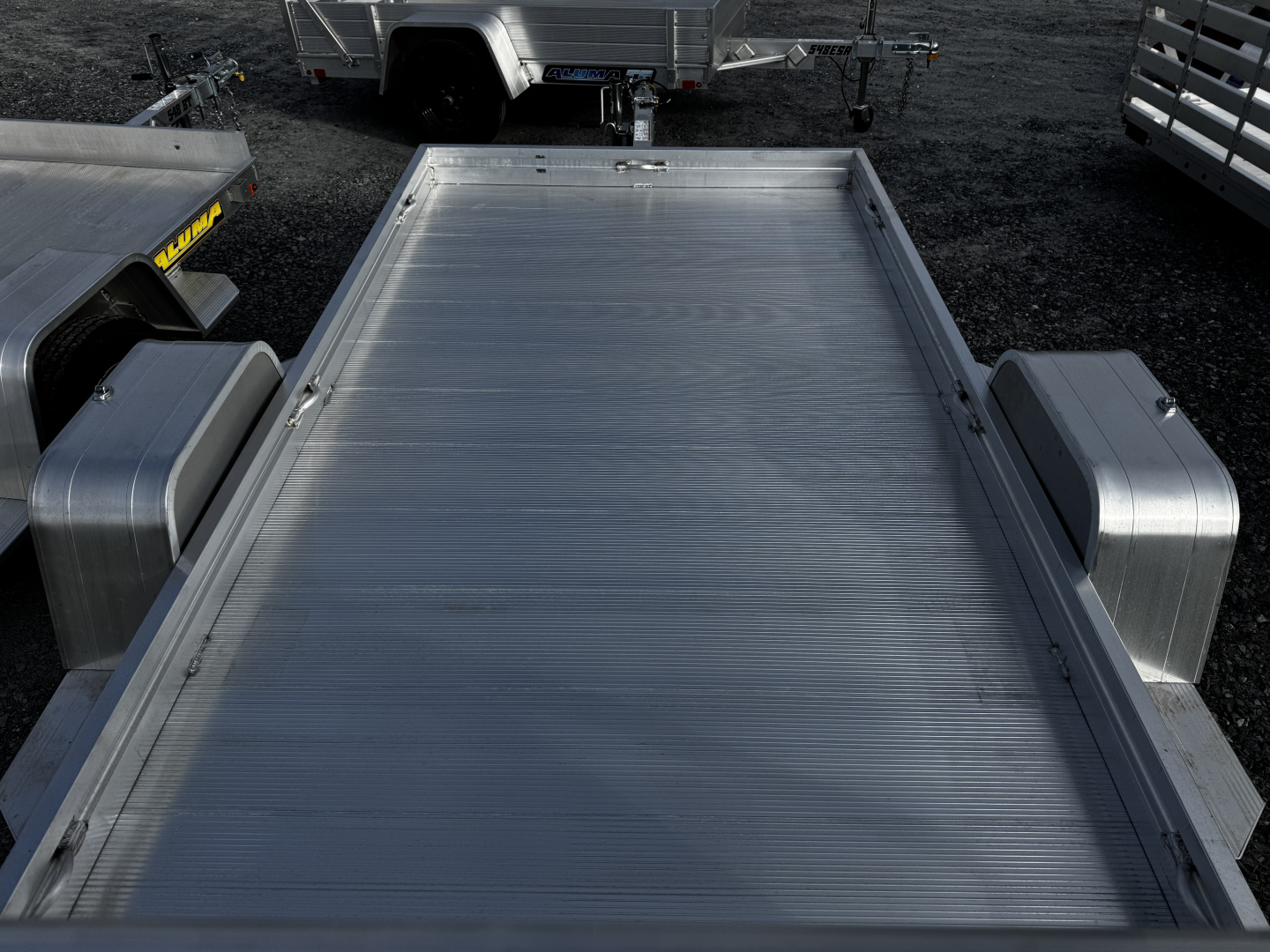 New 2027 Aluma 6310H-S-BT One Piece Gate Utility Trailer