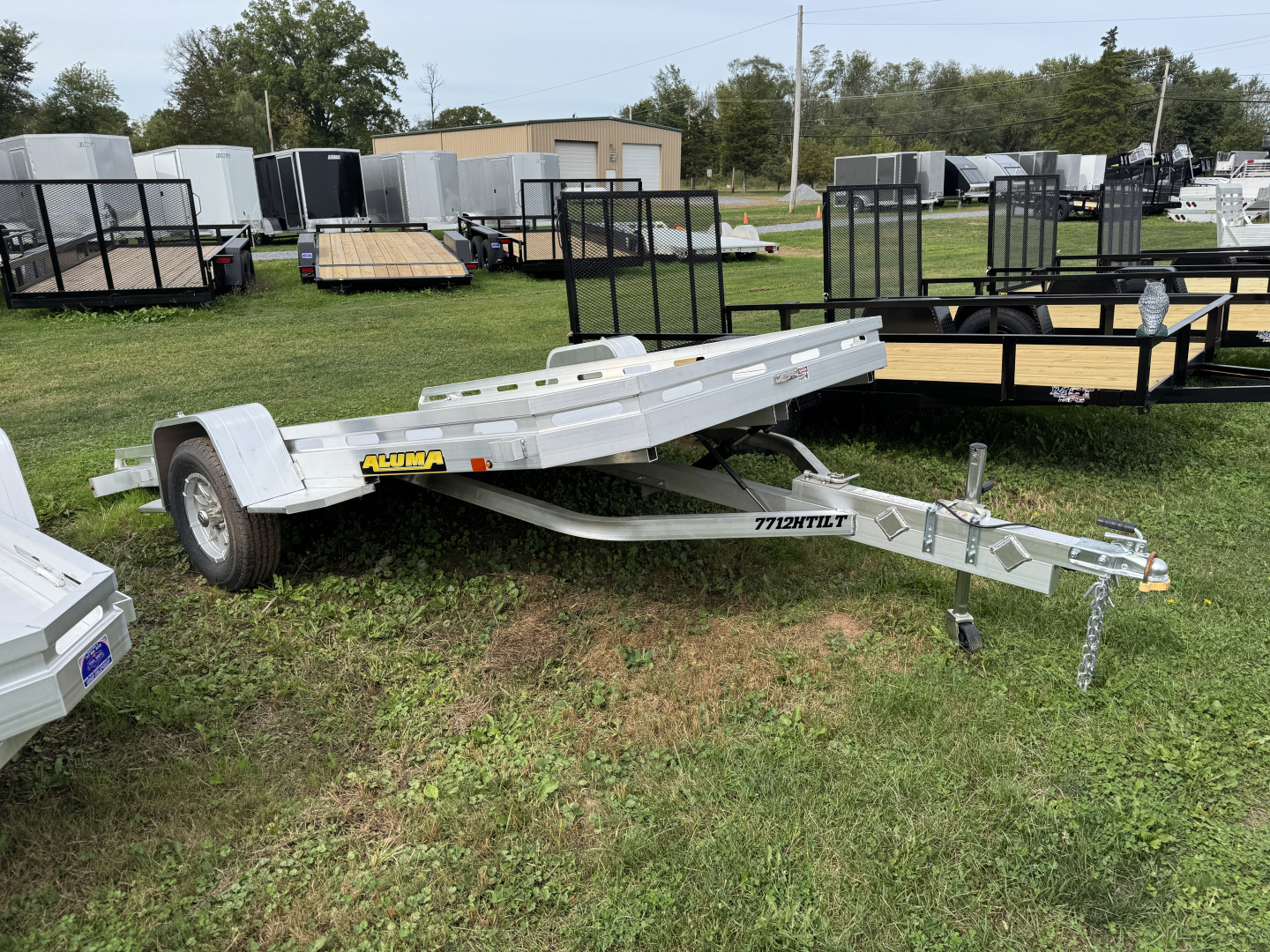New 2026 Aluma 7712H-TILT-S Tilt Deck Utility Trailer