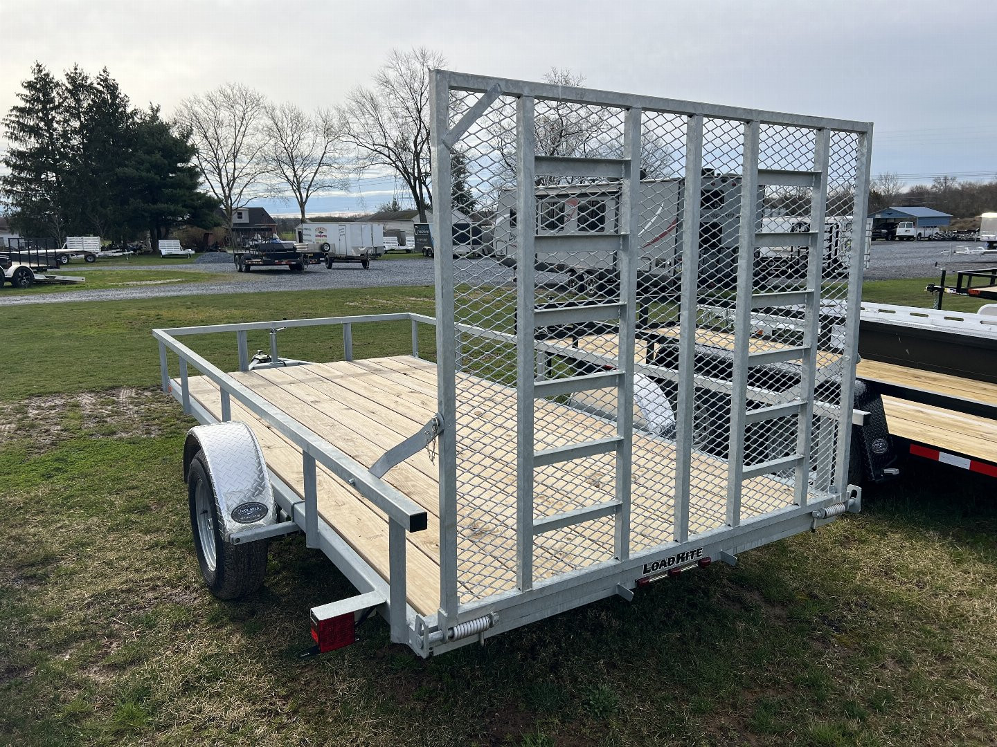 New 2024 LOAD RITE Load Rite UT6514 Galvanized Landscape Trailer Landscape Trailer