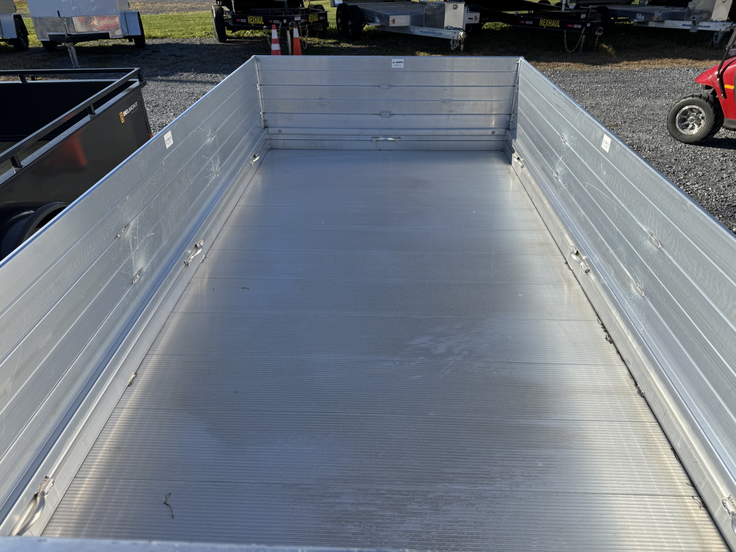 New 2026 Aluma 6310S-BT 2ft Solid Sides Bifold Gate Utility Trailer
