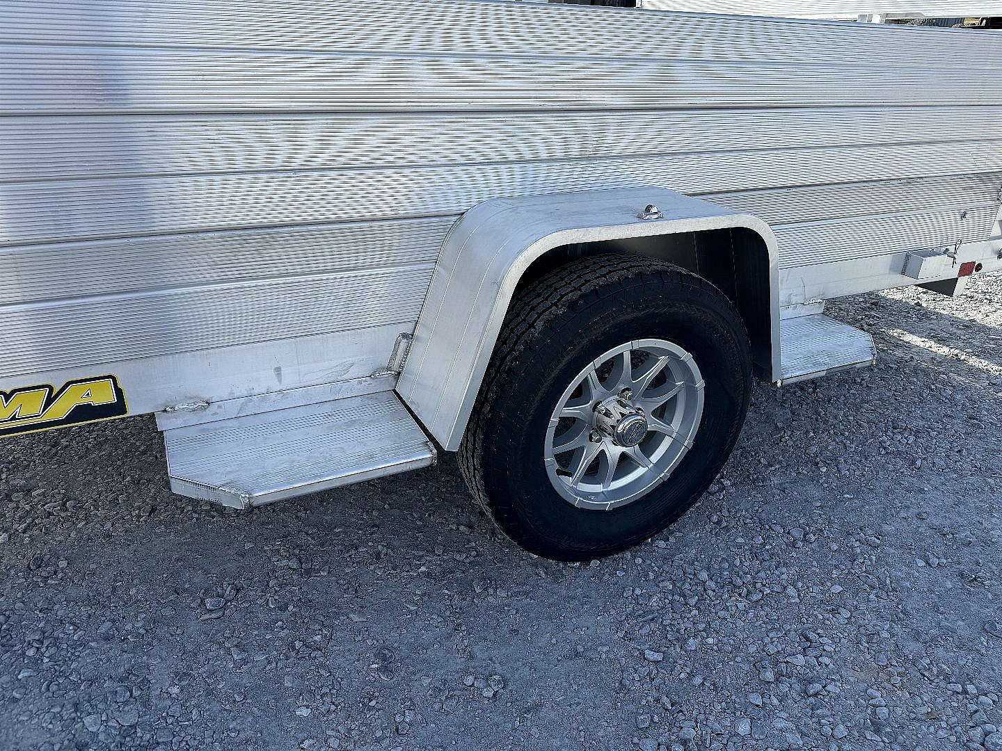 New 2026 Aluma 7712H-S-BT 2 FT Solid Sides Bifold Gate Utility Trailer