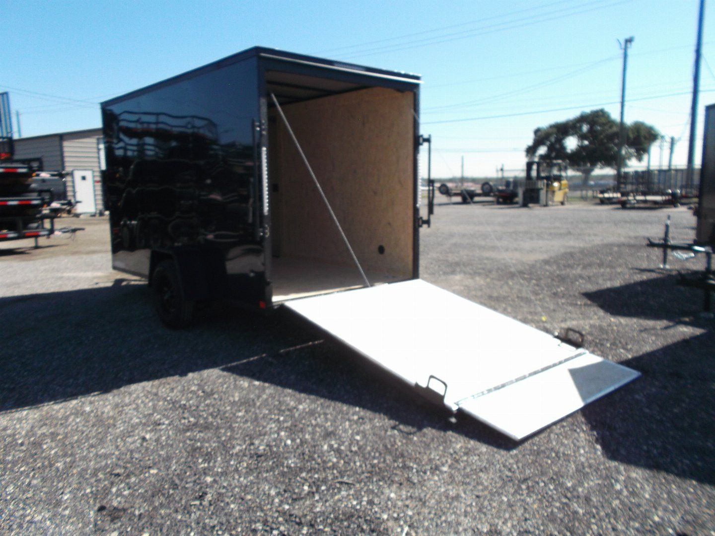 New 2025 COVERED WAGON TRAILERS 6x12 SA Cargo / Enclosed Trailer / 6'6" Interior Height / Extra Wide Ramp Gate / RV Side Door / .030 Black Semi-Screwless Exterior / Black Out Package