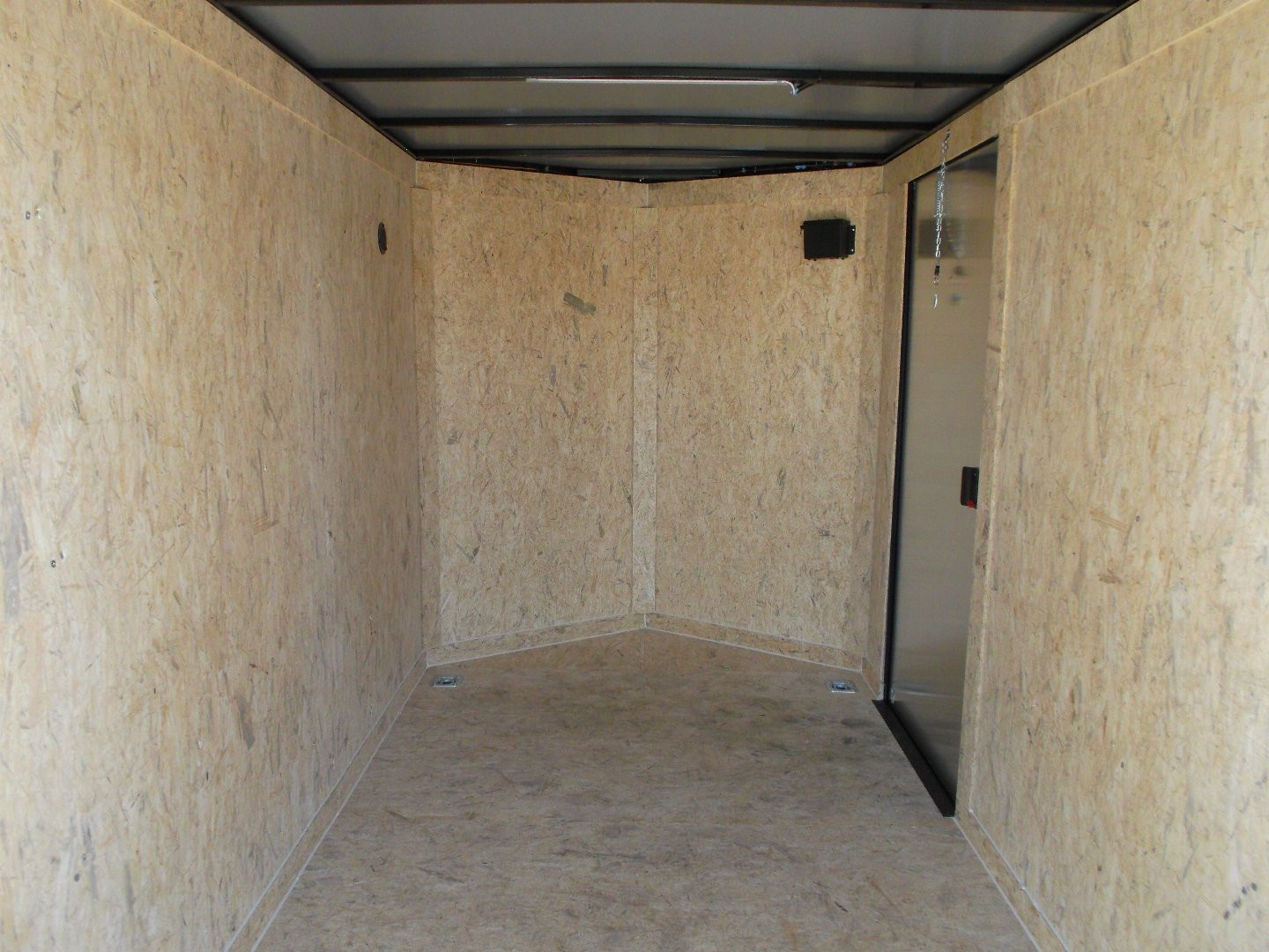 New 2025 COVERED WAGON TRAILERS 6x12 SA Cargo / Enclosed Trailer / 6'6" Interior Height / Extra Wide Ramp Gate / RV Side Door / .030 Black Semi-Screwless Exterior / Black Out Package