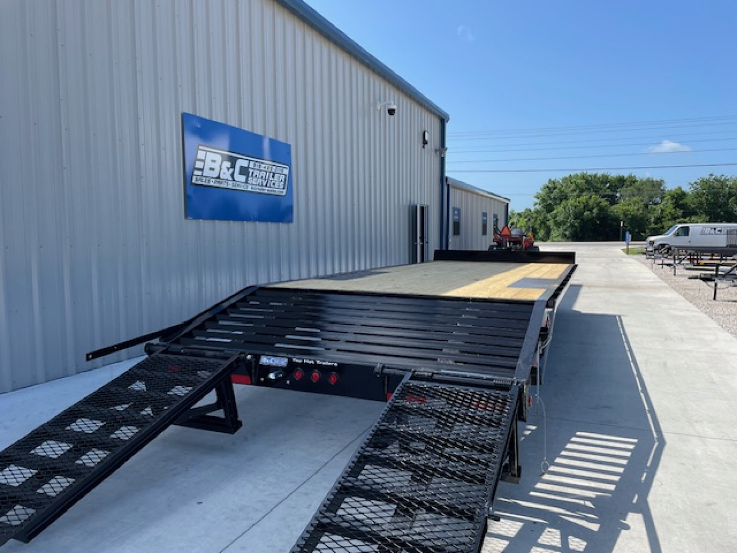 New 2025 TOP HAT 24'X102 DECKOVER BUMPER PULL EQUIPMENT TRAILER, 4' DOVETAIL, (2)7000lb TANDEM AXLES, 14,000lb. GVWR, FOLD UP RAMPS