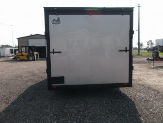 New 2025 COVERED WAGON TRAILERS 8.5x16 Cargo Trailer / Car Hauler / 5200# Axles / 7ft Interior Height / 48" RV Side Door / Bed Lined RV Step / .030 Silver Semi-Screwless Exterior / 60" Triple Tube Tongue / Extra Wide Ramp / Black Out Package