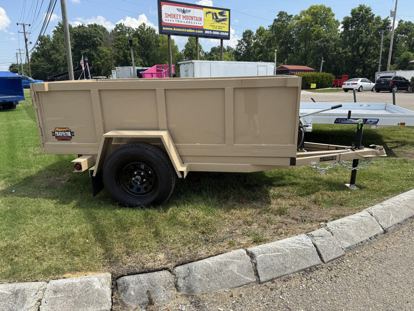New 2025 Prospector 4X8 MANUAL DUMP 24" SIDES Dump Trailer